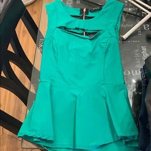 Green peplum shirt